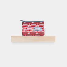 Load image into Gallery viewer, cotton purse with matching zip and lining printed with andrepeat city red bus design

