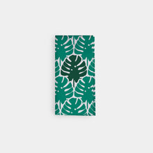Load image into Gallery viewer, Folded organic cotton napkin with cheese plant pattern.
